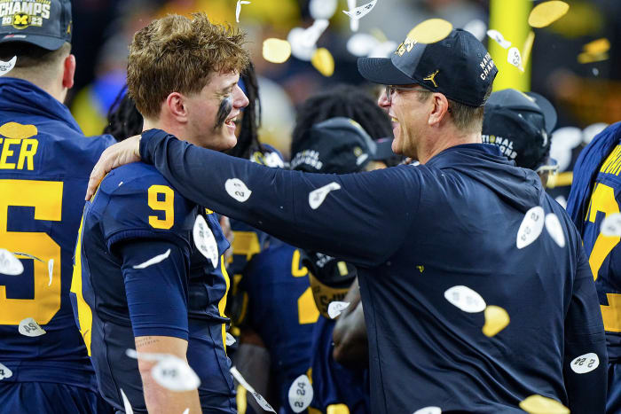 Quarterback J.J. McCarthy (9) threw for 140 yards and ran for 31 to improve to 27-1 as a starter for the Wolverines.